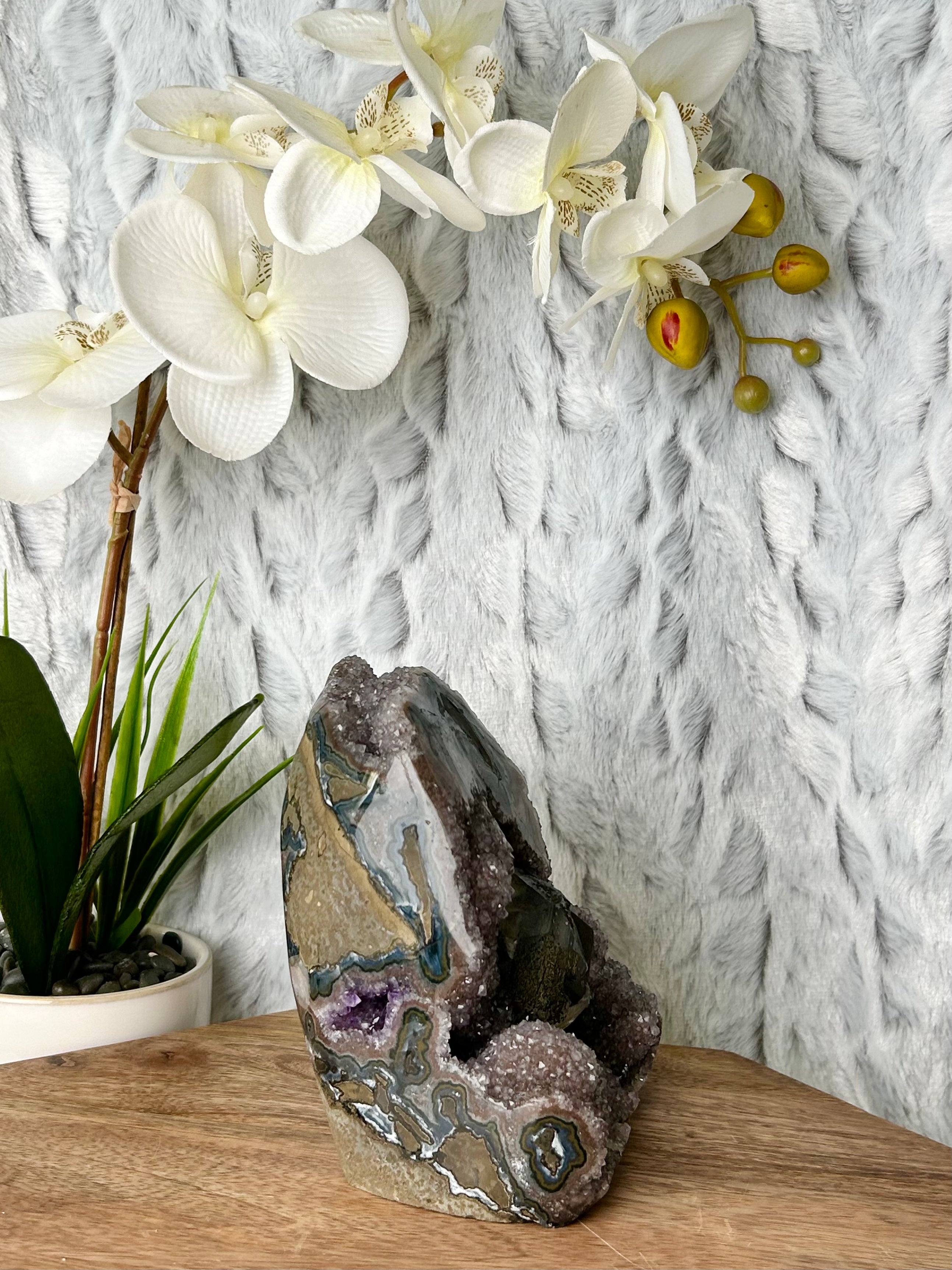 Large Rainbow Uruguayan Amethyst Cut base with Calcite