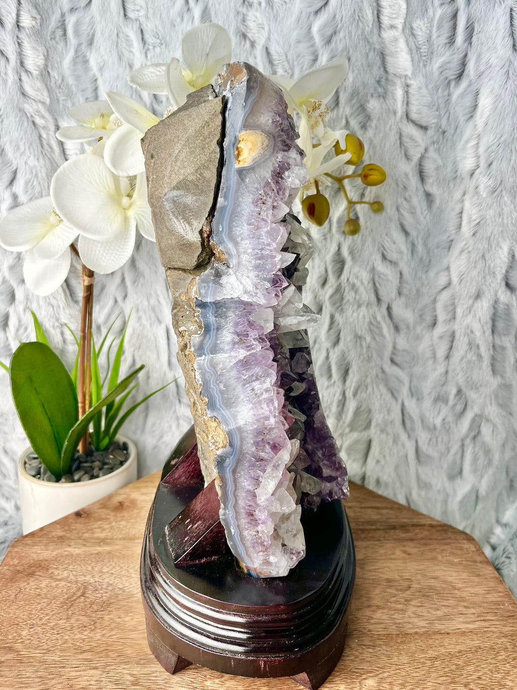 Amethyst with calcite on wooden base