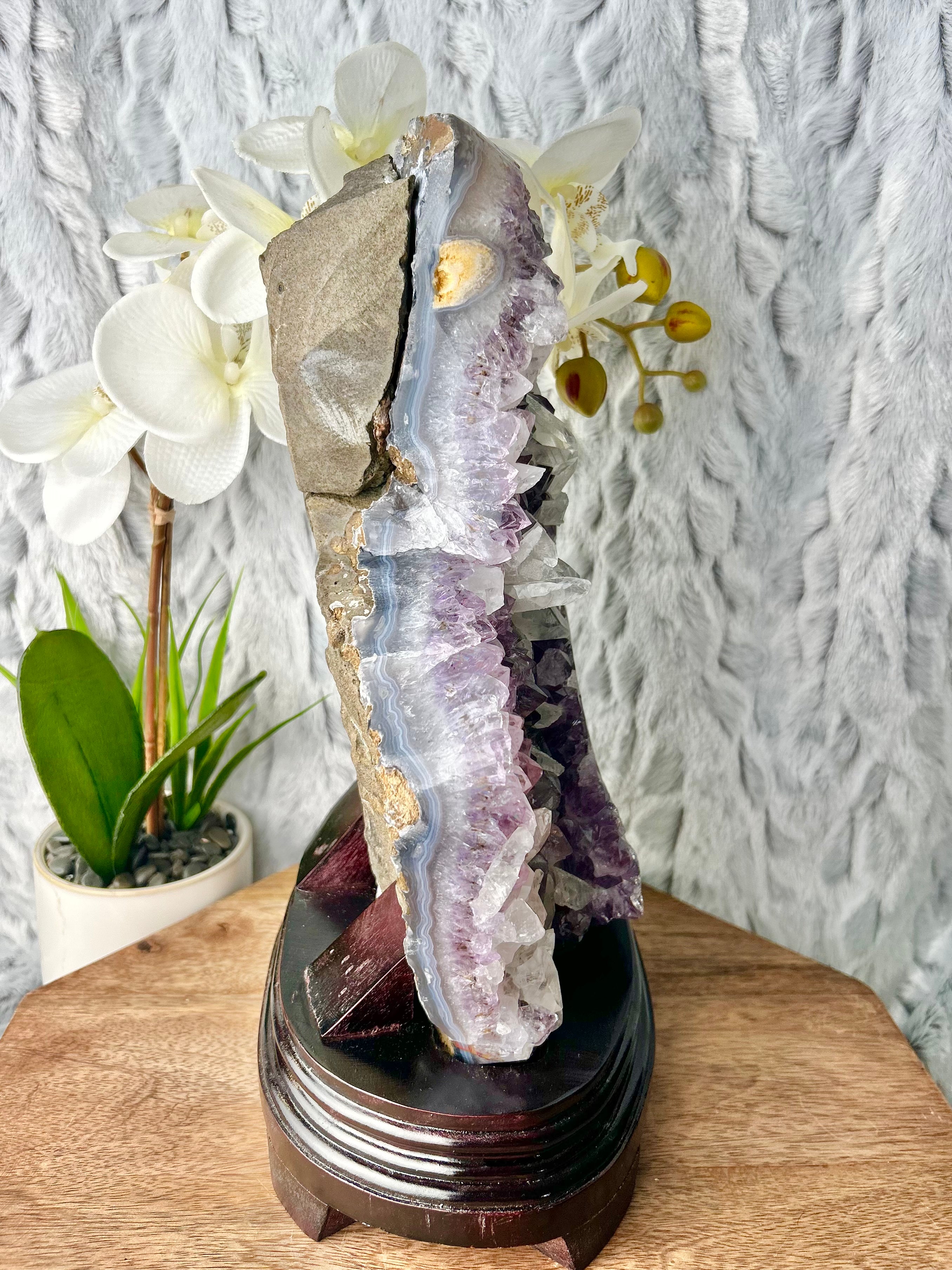 Amethyst with calcite on wooden base