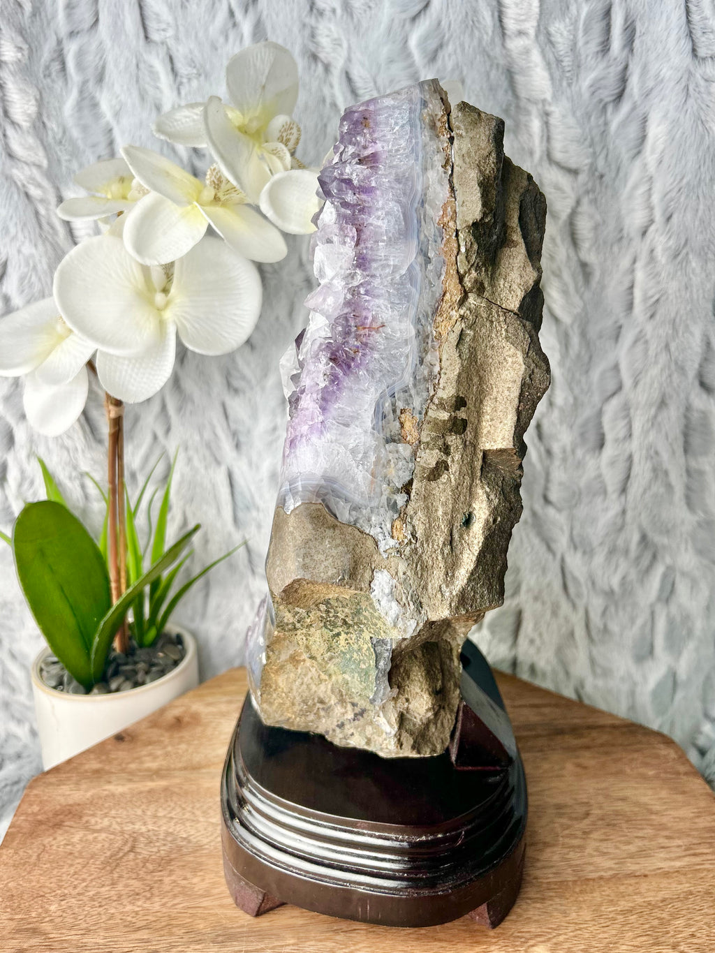 Amethyst with calcite on wooden base