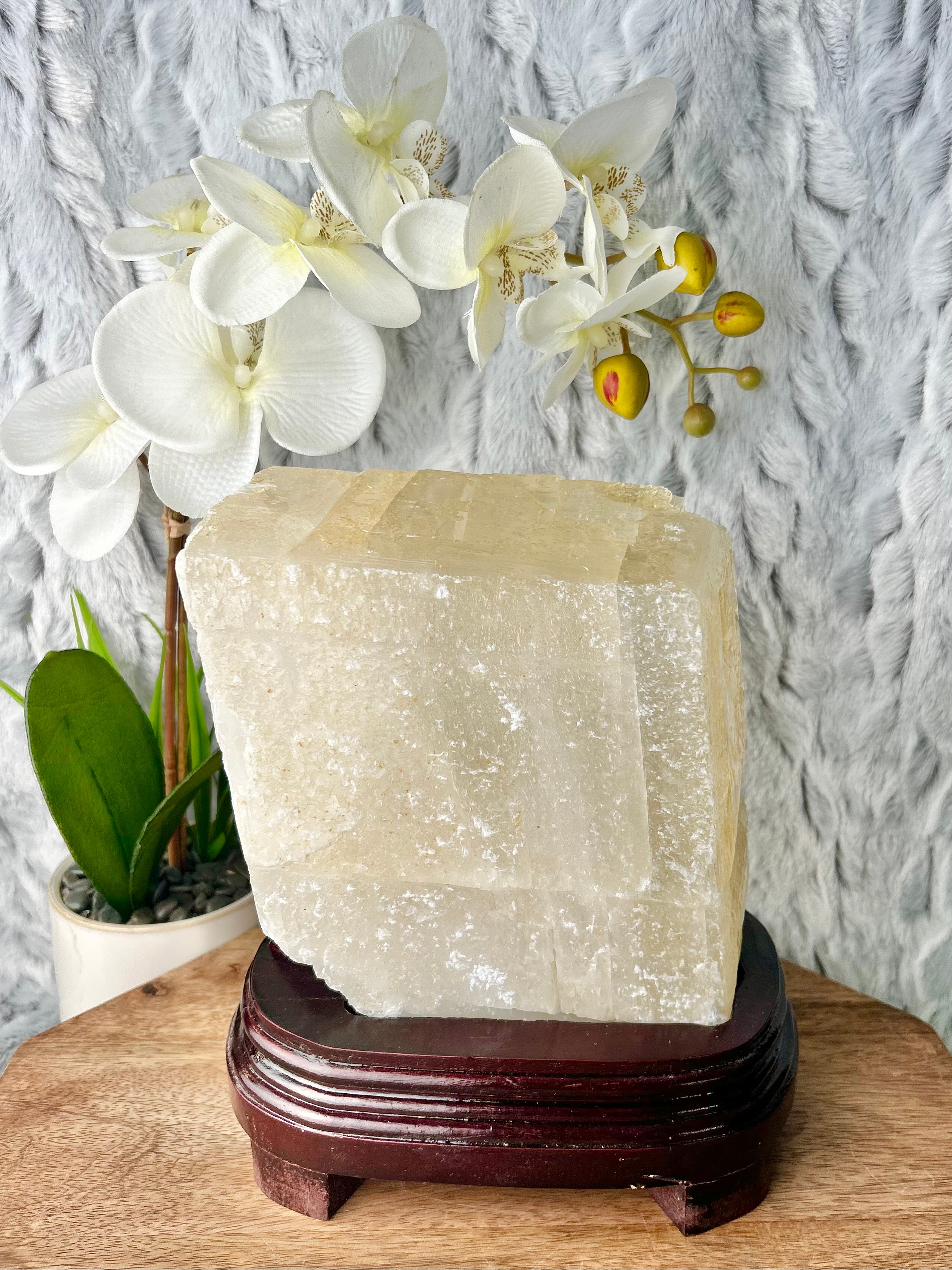 Large Calcite cube on wooden base