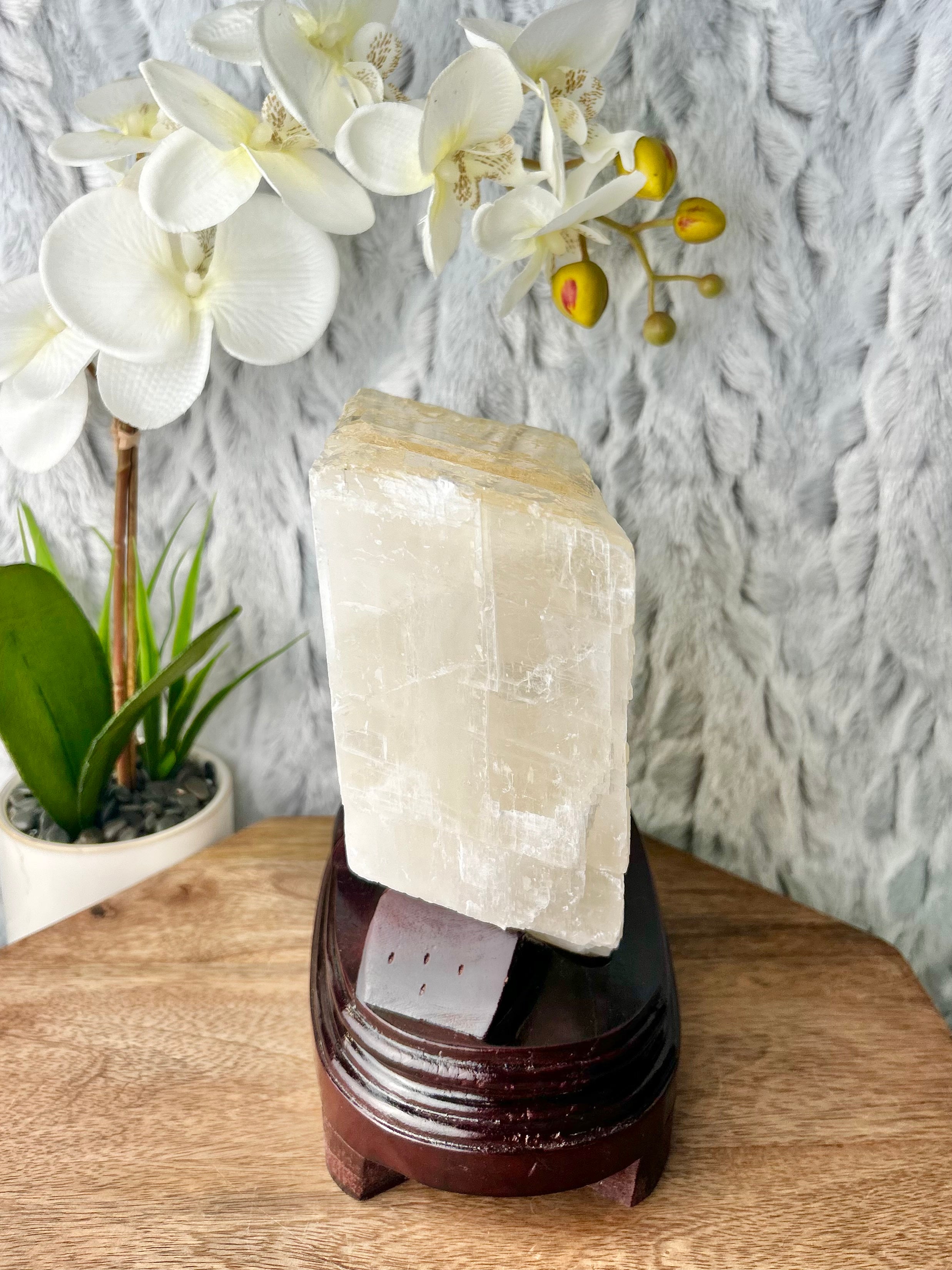 Large Calcite cube on wooden base