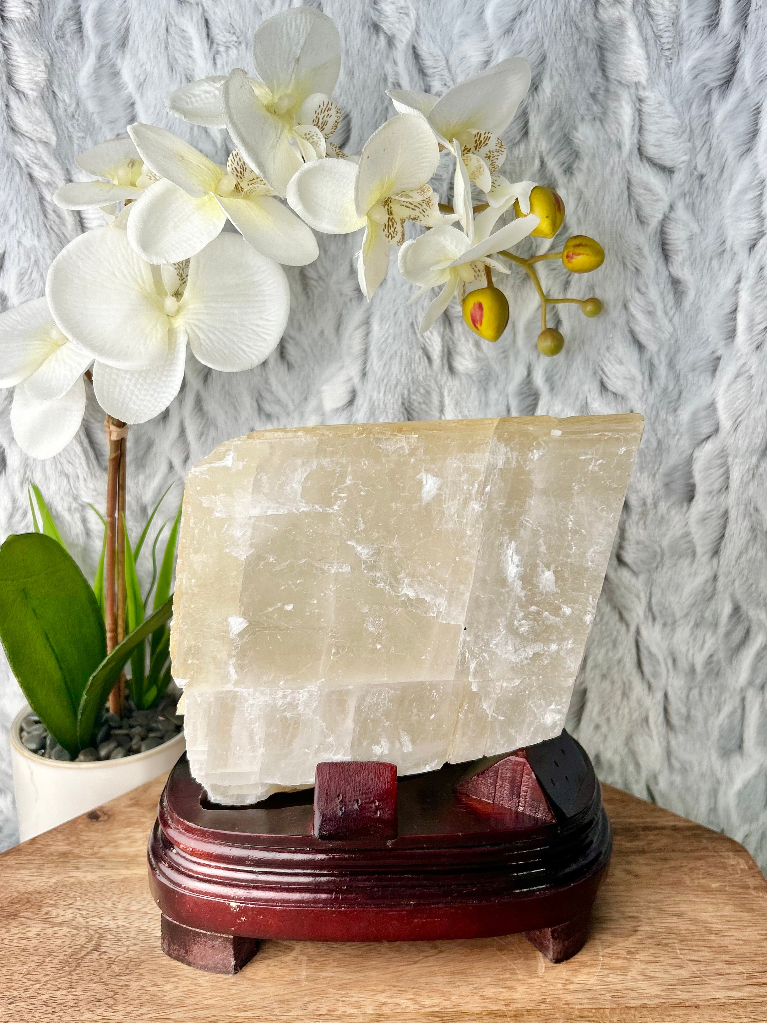 Large Calcite cube on wooden base
