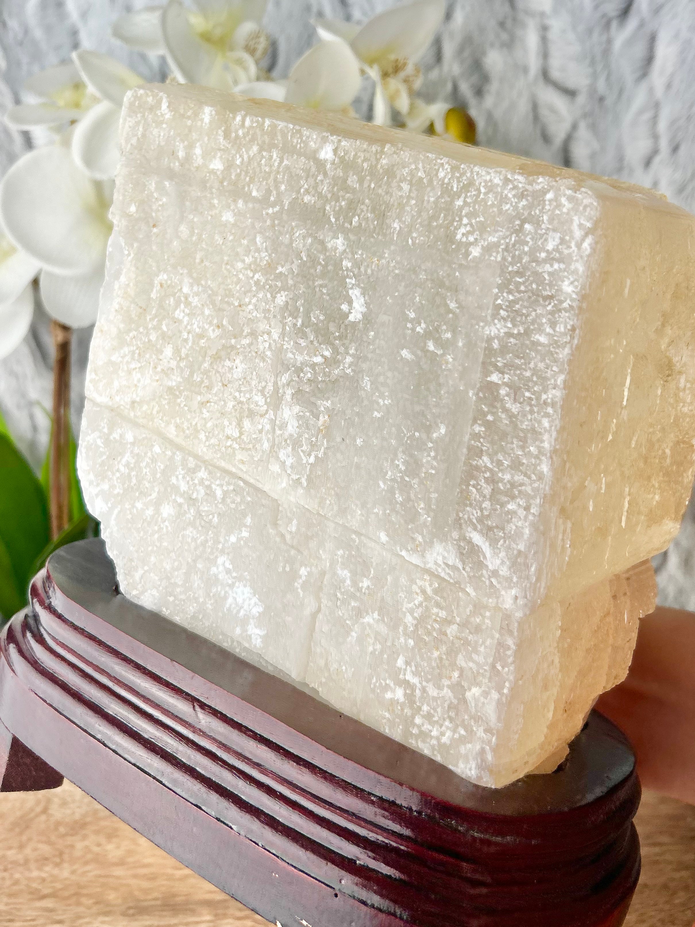 Large Calcite cube on wooden base