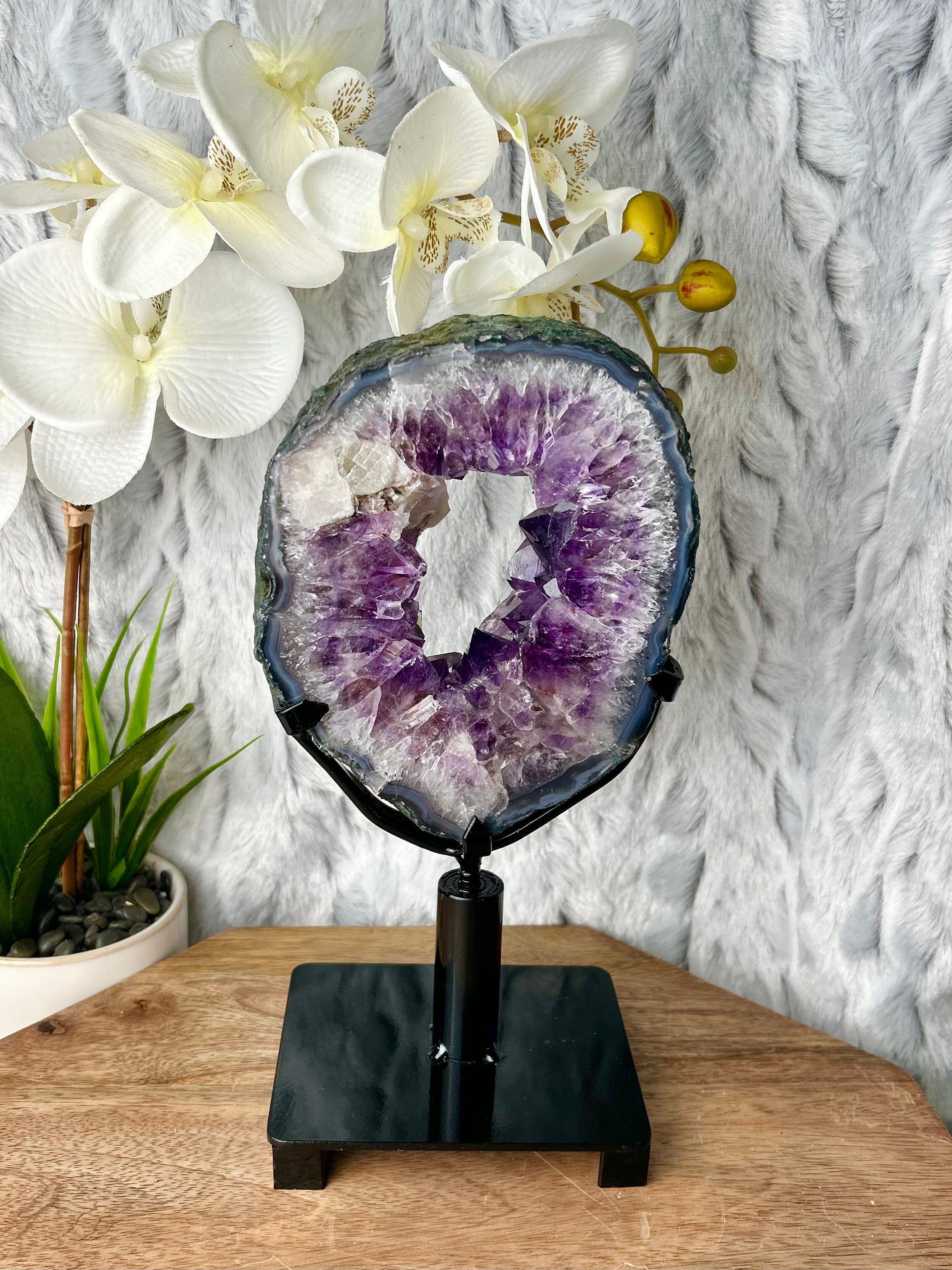 Amethyst portal with Calcite on spinning stand