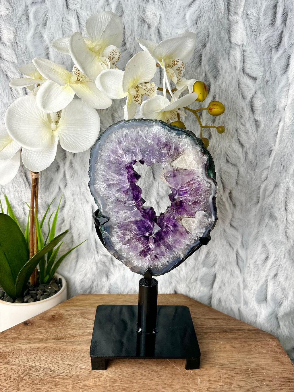 Amethyst portal with Calcite on spinning stand
