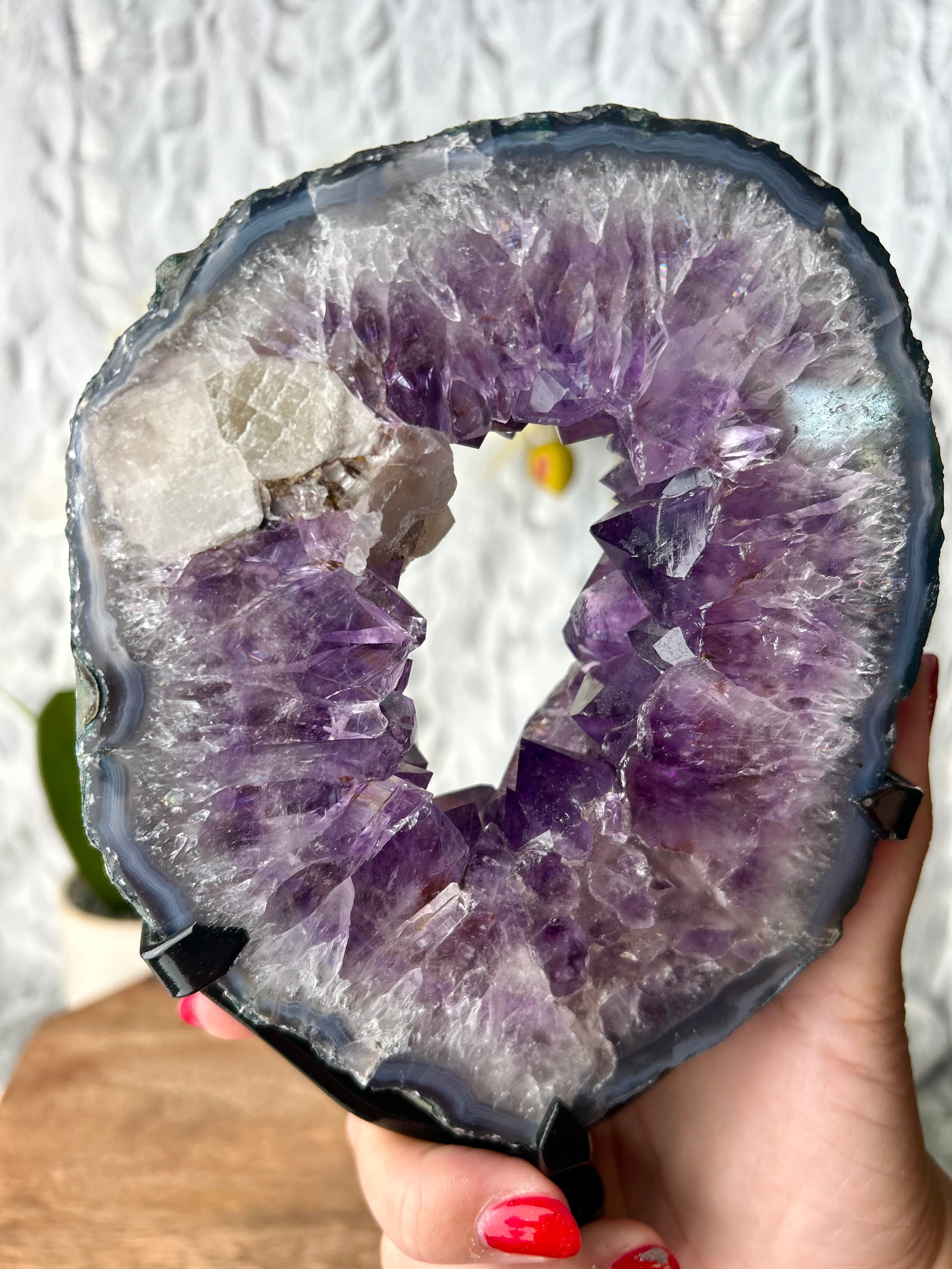 Amethyst portal with Calcite on spinning stand