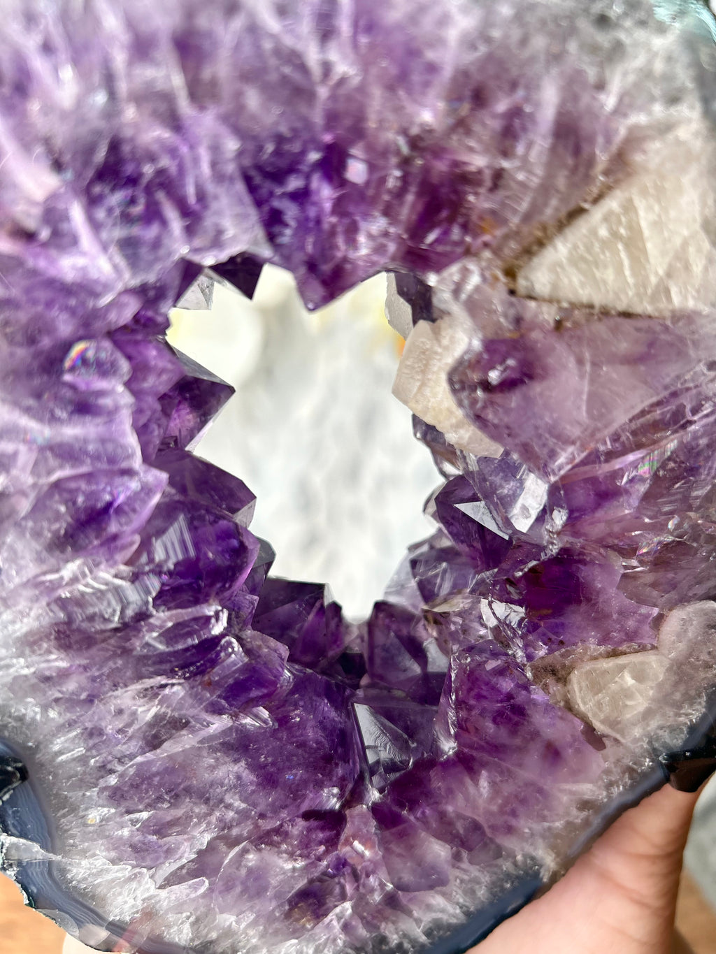 Amethyst portal with Calcite on spinning stand