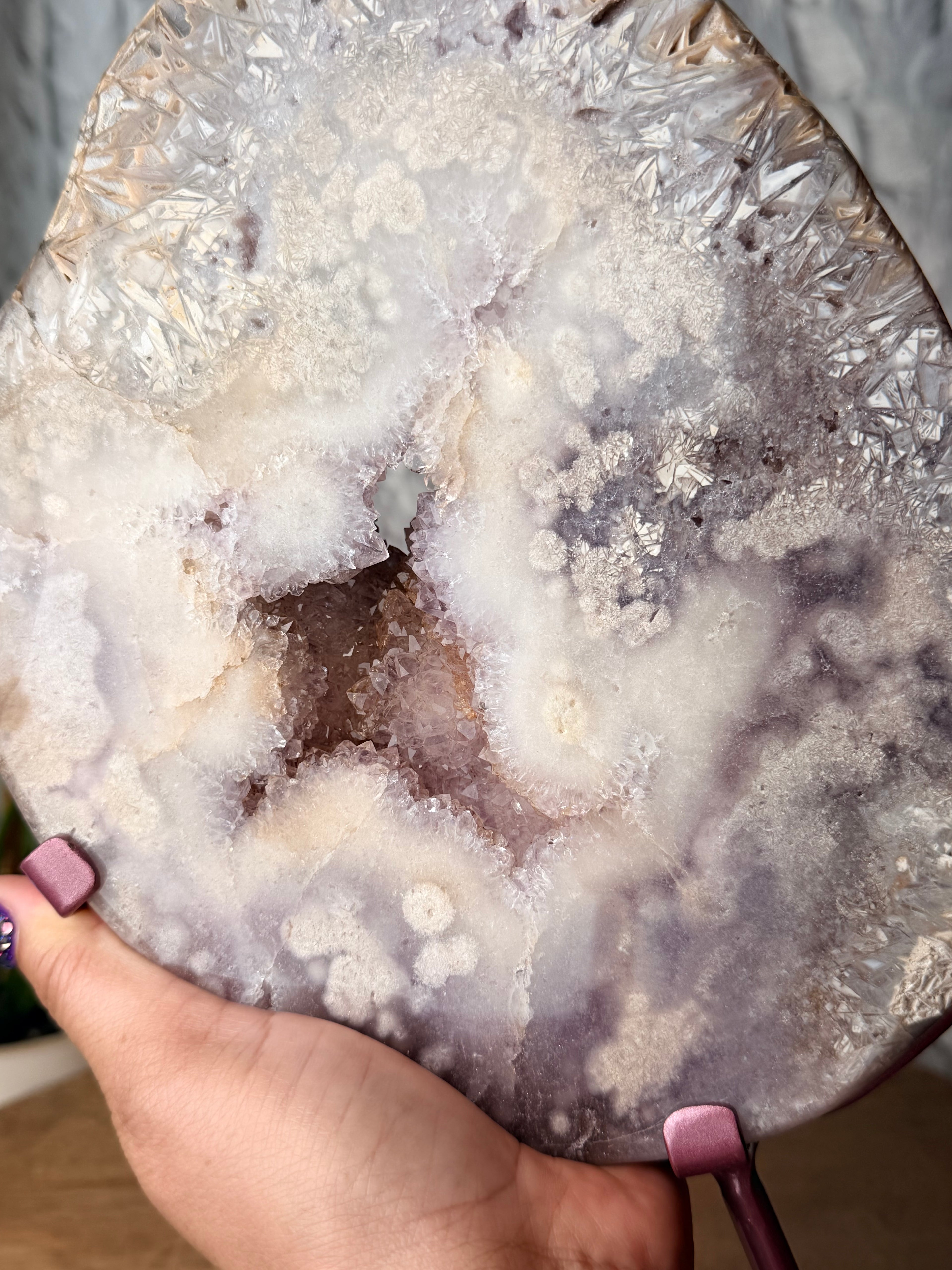 Large Round Rutilated Pink Amethyst Slab on stand
