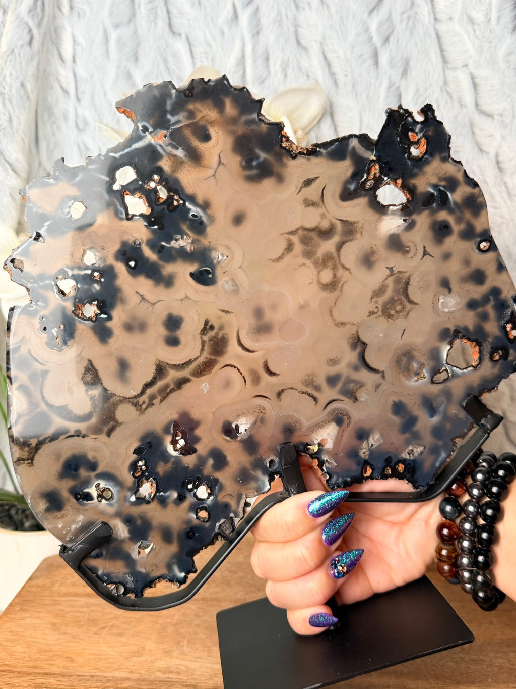 Large Black and Brown Orby Agate slice on stand